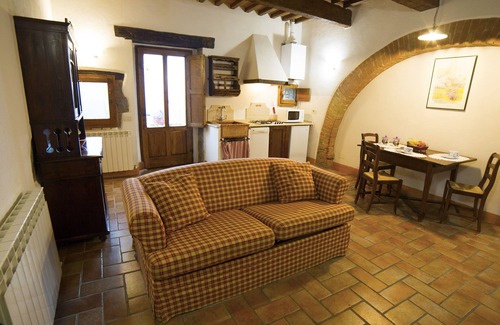 Radicofani Apartment | Apartment in old farmhouse with garden and swimming pool