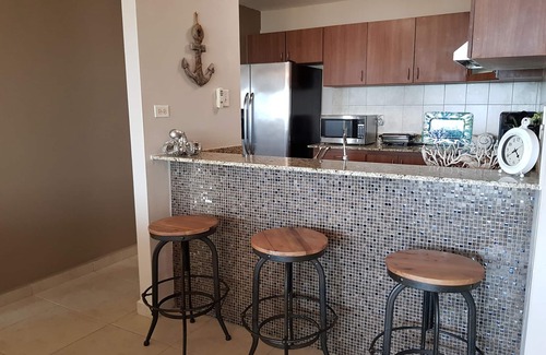 El Combate Apartment | Apartment in the Paradise with Ocean View, Pool, Wifi Ready TV