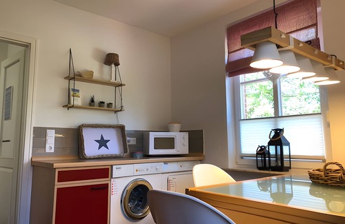 Baltrum Apartment | Apartment 'Inselhuuske I' with Private Terrace, Private Garden and Wi-Fi