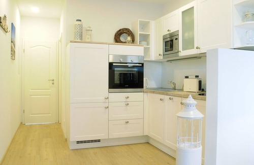 Heiligenhafen House | Apartment KNUT. In the middle. High quality apartments right on the lake.