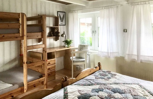 Dorphof Apartment | Apartment Large Reetdachkate - Reetdachkaten in Schuby, Baltic Sea