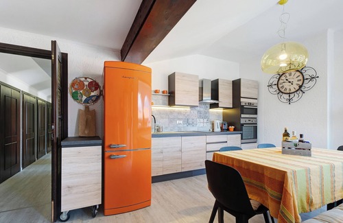 Germignaga Apartment | Apartment 'Mansarda Vialba' in Holiday Home with Lake View and Balconies