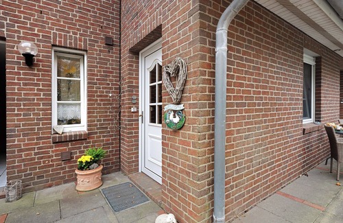 Nordstrand Apartment | Apartment 'Mühlenblick' with Private Terrace, Shared Garden and Balcony