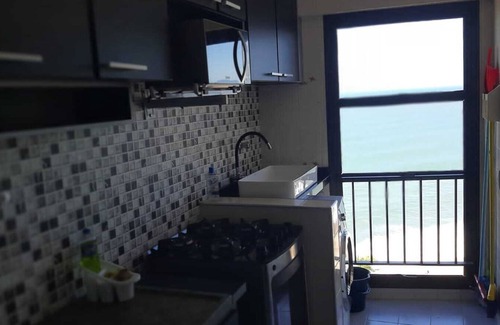 Ipiranga House | Apartment on Martim de Sá beach avenue, sea view, foot in the sand