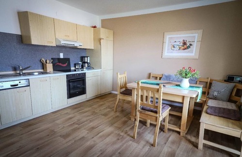 Arnetsried Apartment | Apartment Suite Bauernstube - with infrared cabin and balcony with a view of the Bavarian Forest mountain range