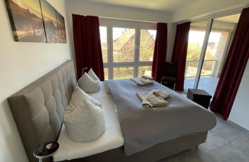 Dangast Apartment | Apartment Seerose, Am Alten Deich 14, Haus 2 Whg. 6 (Parkplatz 27)