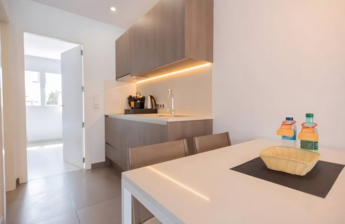 Cala Agulla Apartment | Apartment 'Standard 12' with Shared Pool, Wi-Fi and Air Conditioning