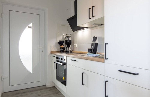 Schillig Apartment | Apartment Steuerbord in Schillg, walking distance to the beach, WLAN, parking, Sky