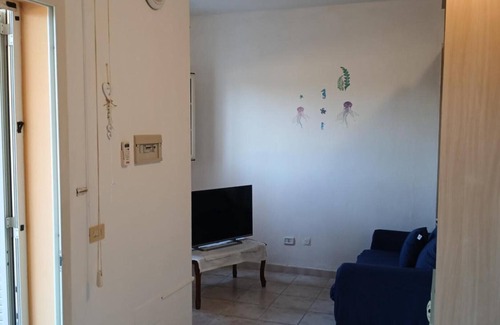 Olbia Apartment | Apartment 'The Lion's Head' with Private Terrace, Wi-Fi and Air Conditioning