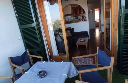 Arenal d'en Castell Apartment | Apartment with Private Pool, Garden and Sea Views