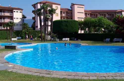 Villaggio Belmonte Apartment | Apartment with a superb lake view, pool and two balconies