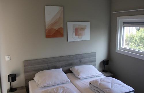 Lathum Ski Chalet | Apartment with Sauna and Terrace in Gelderland