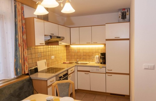 Oberau Apartment | Apartment with sun terrace, ski bus nearby