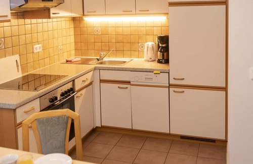 Oberau Apartment | Apartment with sun terrace, ski bus nearby