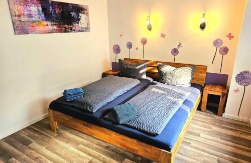 Selk Apartment | Apartments am Selker Noor - mit Naturpark, privater Terrasse und Bachlauf an der Selker Wassermühle