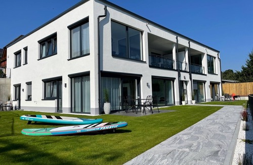 Saaldorf Condo | Apartments -Saaldorf WG 2, terrace and view of the reservoir