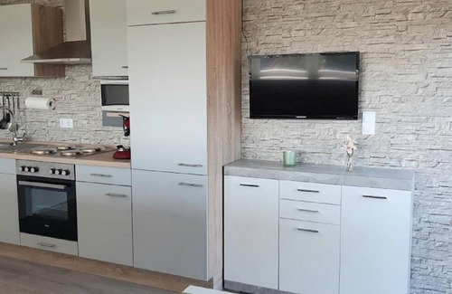 Buchlberg Apartment | Appartement/fewo, Dusche, WC, Wohn-/schlafraum Nr1 - Gästehaus am Sonnenberg