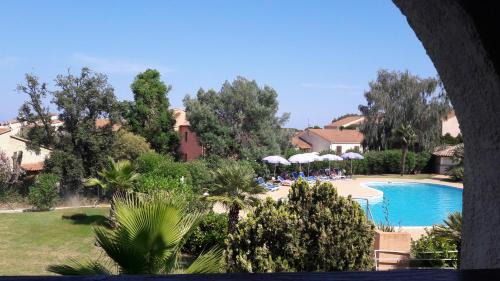 Bravone Apartment | Appartement les pieds dans l'eau 300 m plage - 2 piscines