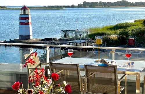 Waase Apartment | Apt "Sunset Lounge" in Waase - Ummanz - Meerblick, Kamin, Sauna