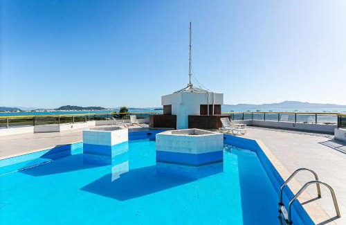 Ponta das Canas Apartment | Apto com varanda e vista mar em Floripa | GVM133