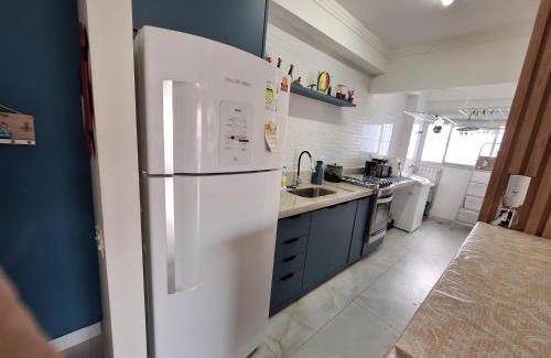 Centro Apartment | Apto em Bertioga , pé na areia