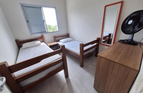 Centro Apartment | Apto em Bertioga , pé na areia