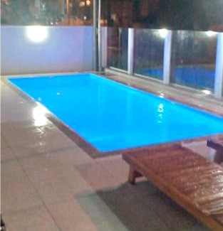 Governador Celso Ramos Apartment | Apto na praia de Palmas, climatizado, com piscina, próximo ao mar e com jardim privativo