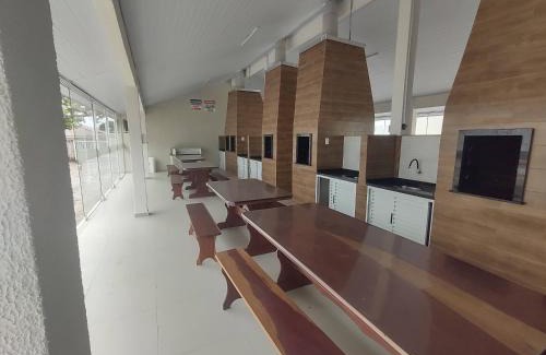 Guaratuba Apartment | APTO TÉRREO a 50 Metros do MAR em Condomínio com PISCINAS MARAVILHOSAS