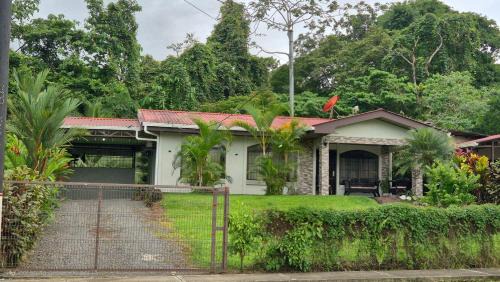 Penas Blancas House | Arboledas house by the River,Forest and Gardens
