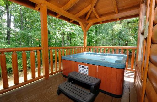 Chalet Village House | Arcade game, hot tub, spacious beautiful log cabin! Gatlinburg log cabin!