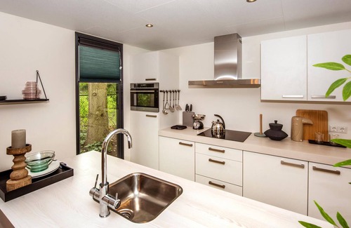 Maasbree House | Are you dreaming of a relaxing and varied vacation close to the water? Then this vacation home might