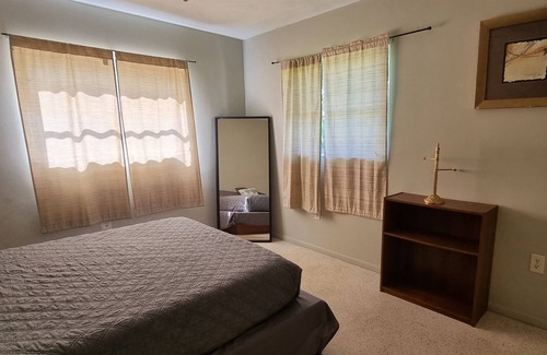 Bayou Oaks House | Art Haven Retreat - Open Plan Home with Sun Room and Fenced Yard