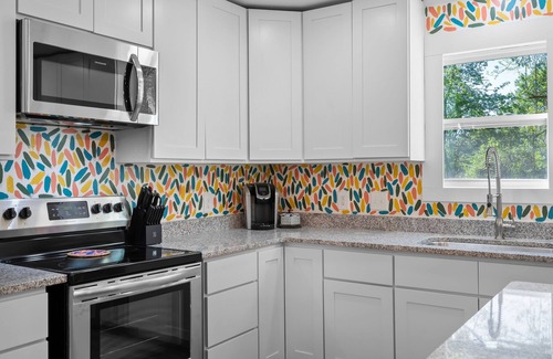 Parker House | Artsy Bungalow in West Village of GVL