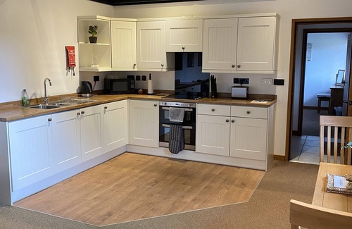 Runnymede Cabin | Ash lodge sleeps two people in a peaceful, private setting.