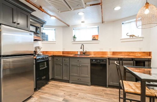 Central Business District Apartment | Aspenwood Manor- Brand New Basement Apartment Inspired by Southern Utah