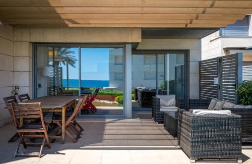 Torredembarra Villa | AT051 A pocos metros de la playa, equipamiento completo, piscina comunitaria