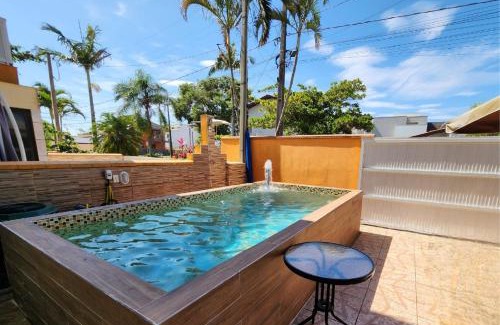 Pontal do Parana House | ATAMI STAY Casa em Condomínio com Piscina Aquecida a 1 Quadra do Mar