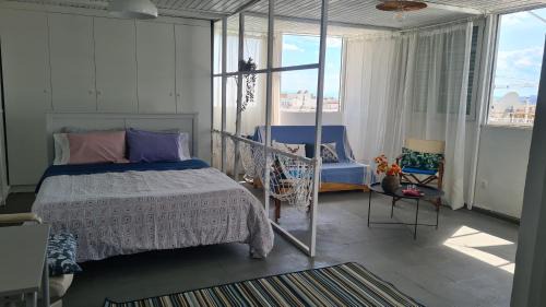 Nea Chalkidona Apartment | Athens city view loft on a budget
