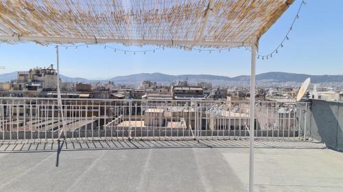 Nea Chalkidona Apartment | Athens city view loft on a budget