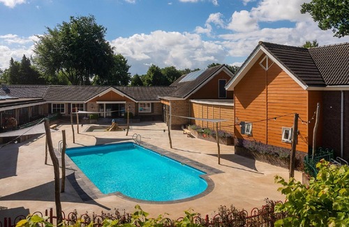 Voorthuizen House | Attractive Bungalow with Covered Terrace near Veluwe