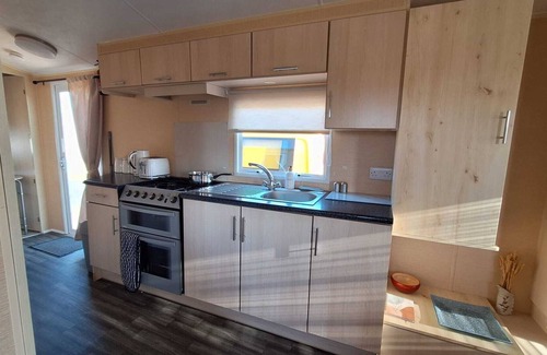 Lossiemouth House | Aurora on the Dunes: Coastal Stay Near West Beach with Lighthouse View!