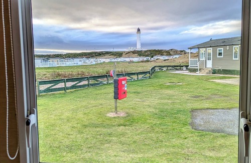 Lossiemouth House | Aurora on the Dunes: Coastal Stay Near West Beach with Lighthouse View!
