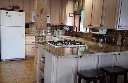 Pagosa Springs Cabin | Authentic lakefront log cabin with mountian views. Ice off! Come fishing!