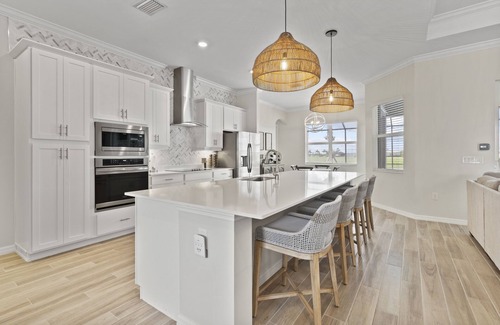 Immokalee House | Ave Maria, The National Golf Course, swimming pool and hot tub.