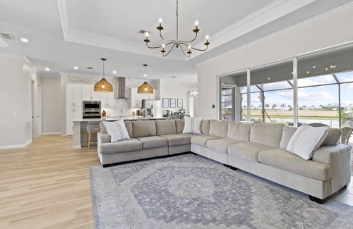 Immokalee House | Ave Maria, The National Golf Course, swimming pool and hot tub.