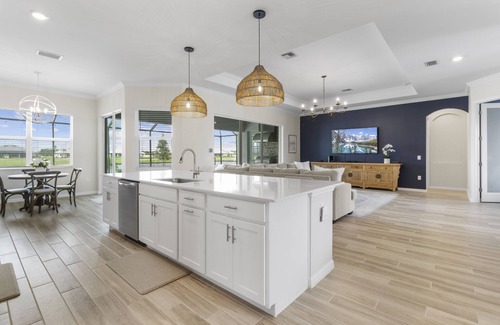 Immokalee House | Ave Maria, The National Golf Course, swimming pool and hot tub.