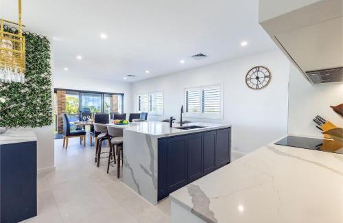Nelson Bay House | Away Nelson Bay, 29 Wollomi Ave - Spacious family home with water views, pet friendly, Wifi & aircon