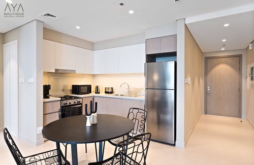 Dubai Apartment | Aya - Elegant 1BR Apartment With Balcony and Creek Views