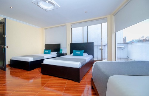 Barrios Unidos Hotel | Ayenda Normandy