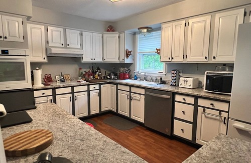 Pittsburg House | Back Lake Spacious five-bedroom home on Spooner Road